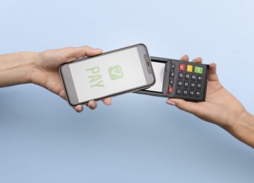 person paying with its smartphone wallet app scaled